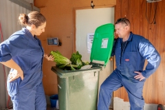 Olympia Yarger and Chris Stevenson obverse foddering waste collected from supermarkets brought to GoTerra facilities in Canberra, Australia.